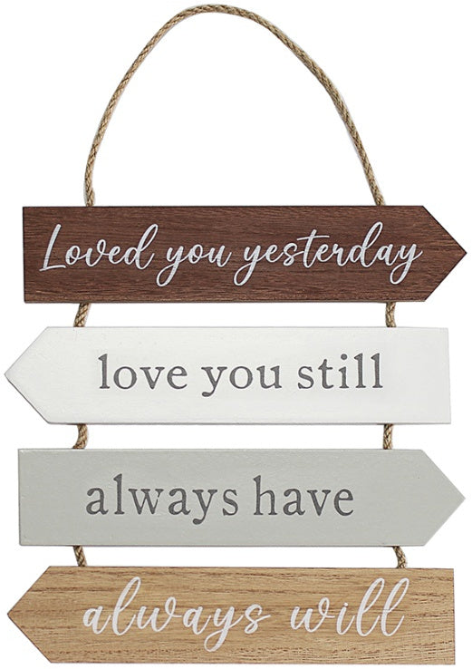 White plaque with 'Loved you Yesterday love you still always have always will' romantic quote