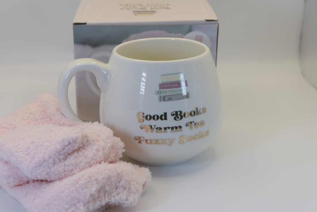 Embrace the ultimate cosy moment with our 'Good Books Warm Tea Fuzzy Socks' Mug &amp; Socks Set. 