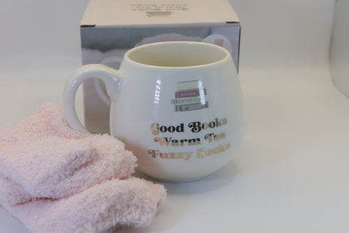 Embrace the ultimate cosy moment with our 'Good Books Warm Tea Fuzzy Socks' Mug &amp; Socks Set. 