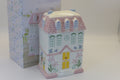 Add a touch of whimsy to your home with our enchanting Pastel House Shaped Ceramic Oil Burner and Wax Warmer. 
